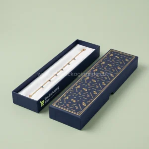Custom anklet boxes - navy long two-piece rigid anklet box with gold bell and paisley print by Pro Packaging Line