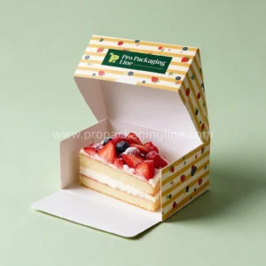 Striped printed cake slice box with hinged lid and strawberry cake