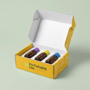 Custom sunflower yellow essential oil mailer box with insert holding three oil bottles with colored caps