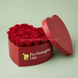 Custom red heart-shaped rigid flower box filled with red roses by Pro Packaging Line