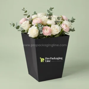 Custom black tapered bouquet flower box with white roses and eucalyptus by Pro Packaging Line