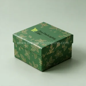 Custom mint rigid gift box in forest green with gold botanical mint sprig illustrations