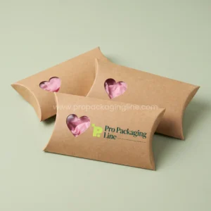 Custom kraft pillow favor boxes with heart-shaped window and pink tissue by Pro Packaging Line