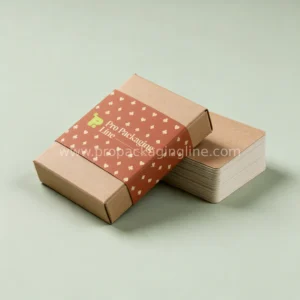 Kraft playing card box with terracotta printed belly band