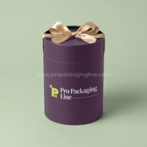Custom tall plum round gift box with champagne satin bow on the lid by Pro Packaging Line