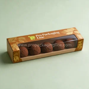 Long caramel truffle box with window showing five truffles