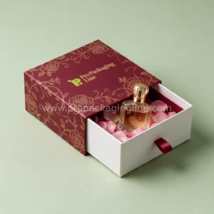 Wine red drawer gift box with perfume and rose petals