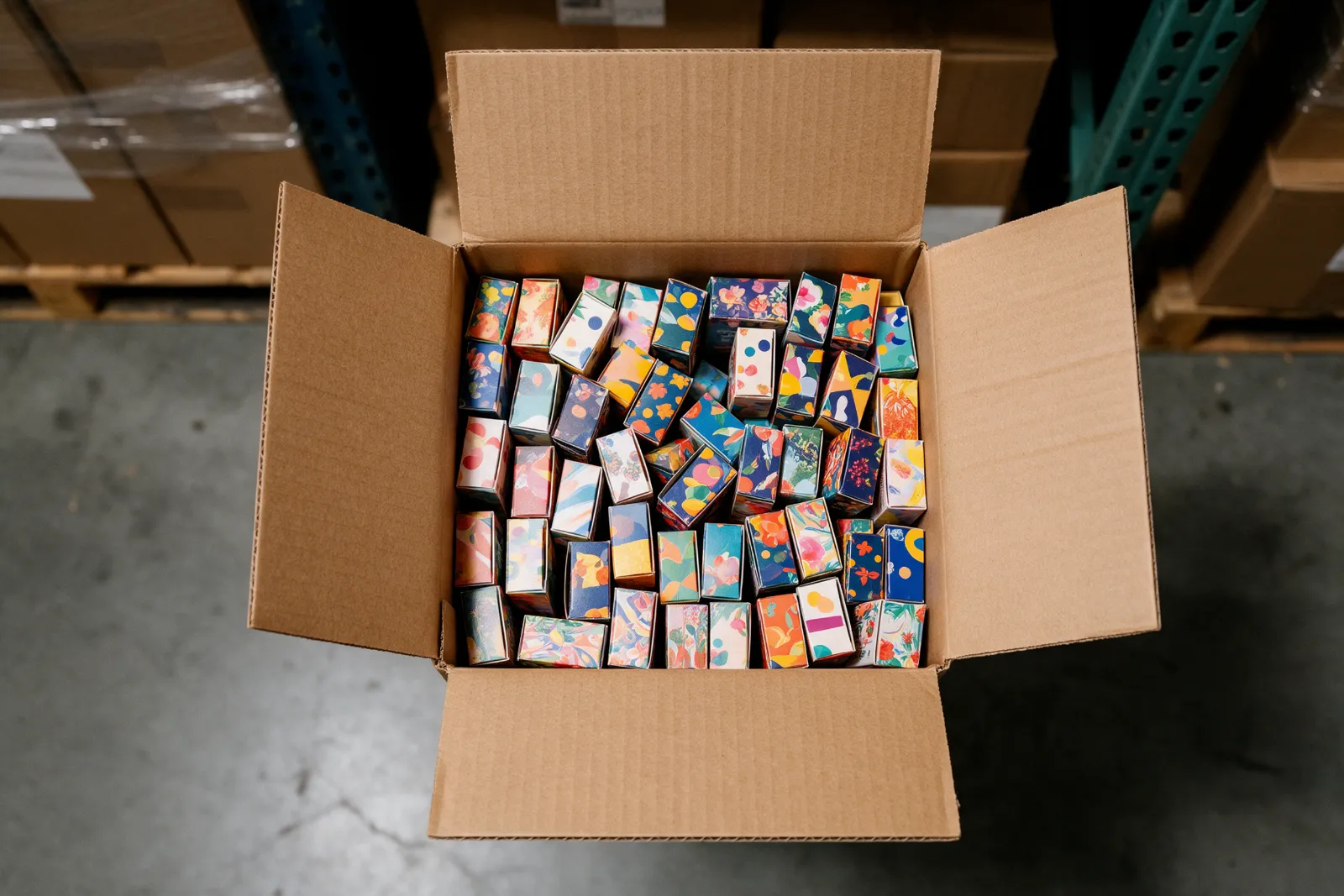 Tuck-end cartons packed inside a corrugated shipping carton